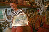 Slavomir Kadic with Olive oil quality award. Click for larger image